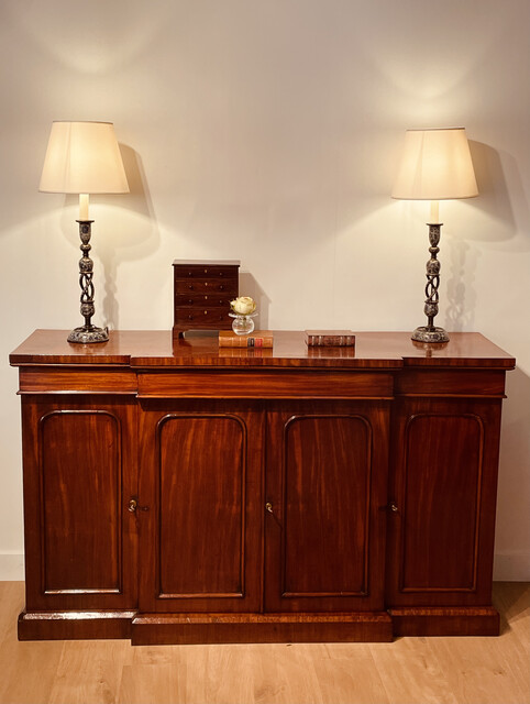 An English 19th Century Mahogany Areakfront Side Board having one Drawer.