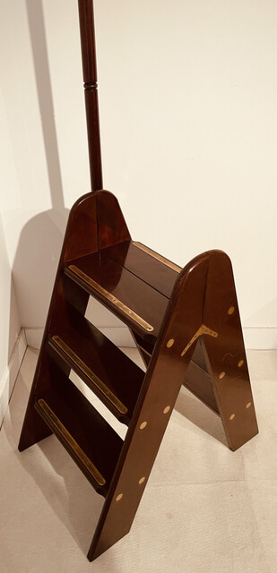 An English 19th Century Mahogany Double Library Step having a tall Hand Support Pole.