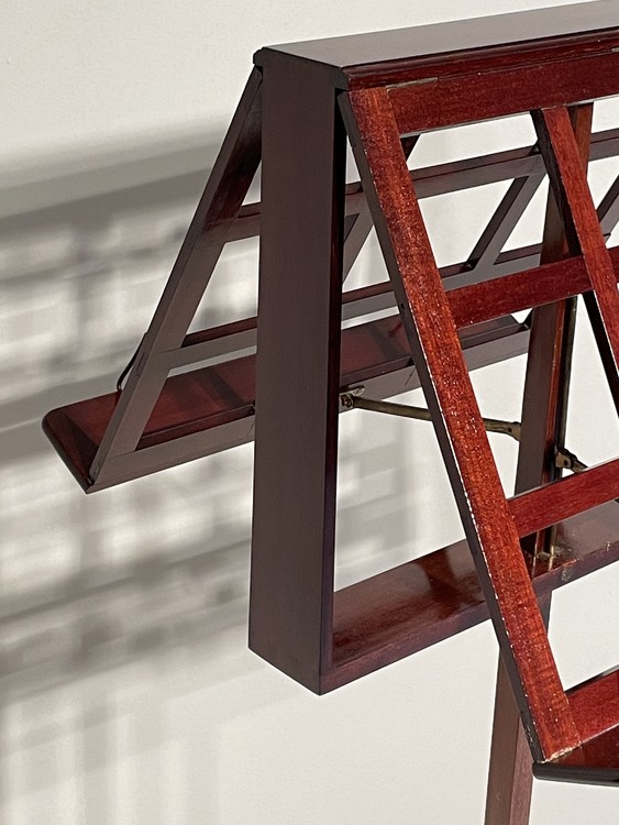 An English 19th Century Mahogany Double Music Stand on a Tripod Base and Adjustable in height.