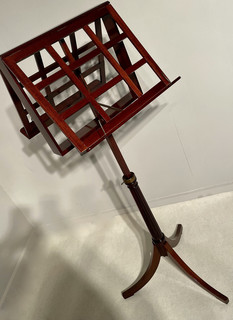 An English 19th Century Mahogany Double Music Stand on a Tripod Base and Adjustable in height.