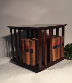 An English 19th Century Mahogany Mini-Revolving Bookcase.