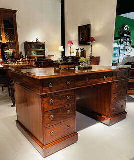 An English 19th Century Mahogany Partners Desk having a Beautiful Old Leather.