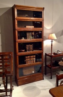 An English 19th Century Oak Globe Wernicke Bookcase