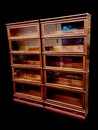 An English 19th Century Pair of Mahogany Globe Wernicke Bookcases having a beautiful Inlay.