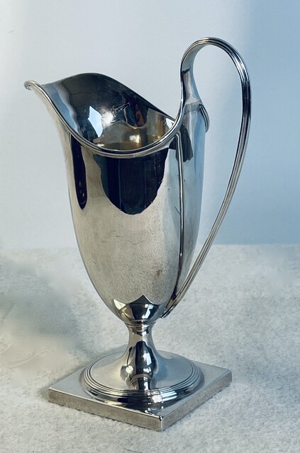 An English 19th Century Sterling Silver ' Helmet ' Cream Jug. Sheffield , 1897.