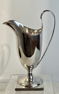 An English 19th Century Sterling Silver ' Helmet ' Cream Jug. Sheffield , 1897.