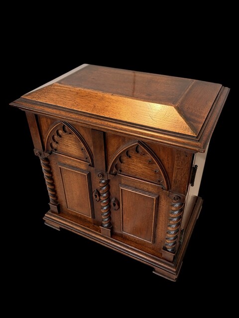 An English 19th Century Walnut Neo-Gothic Apprentice Piece Cabinet.
