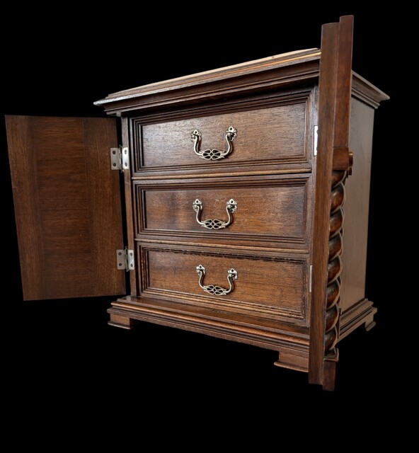 An English 19th Century Walnut Neo-Gothic Apprentice Piece Cabinet.