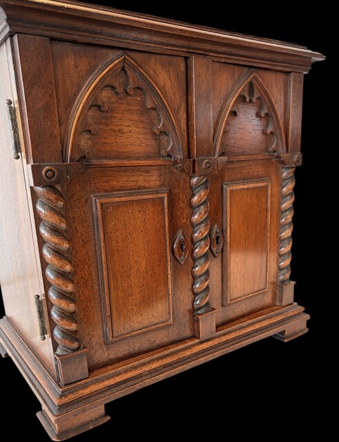 An English 19th Century Walnut Neo-Gothic Apprentice Piece Cabinet.