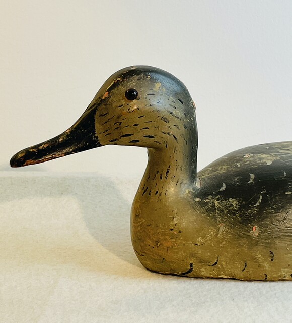 An English Antique Hand Carved Wooden Decoy Duck . Ca 1900.