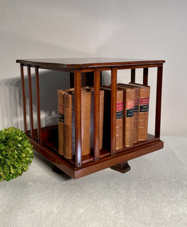 An English Antique Mahogany Mini-Revolving Bookcase.