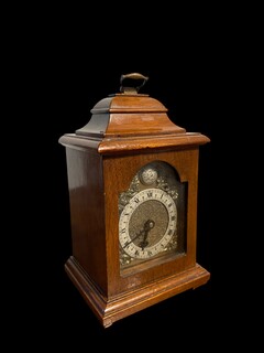 An English Antique Mahogany Small Elliott Clock.