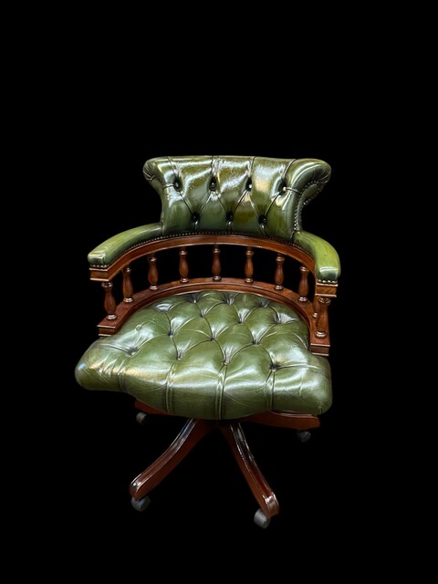 An English Antique Revolving Captains / Desk Chair. Reclining and adjustable in height.