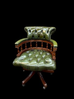 An English Antique Revolving Captains / Desk Chair. Reclining and adjustable in height.