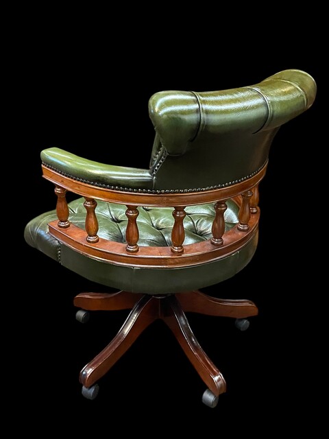 An English Antique Revolving Captains / Desk Chair. Reclining and adjustable in height.