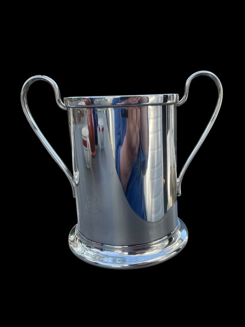 An English Antique Silverplated Bottle Holder.
