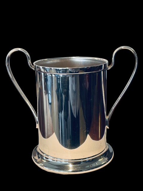 An English Antique Silverplated Bottle Holder.