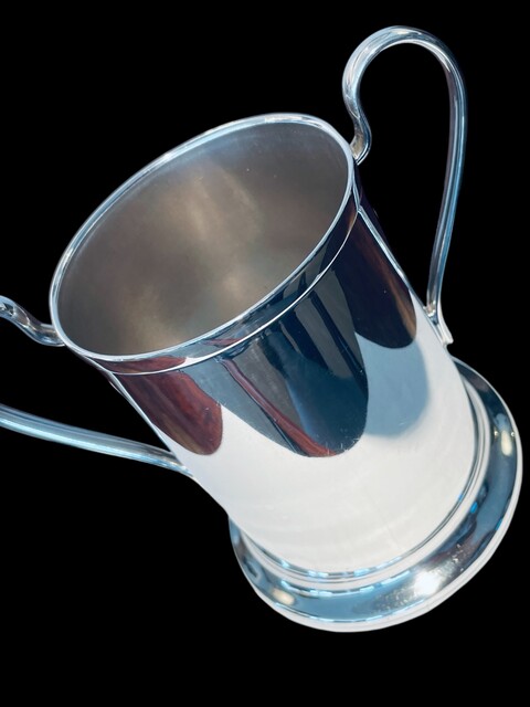 An English Antique Silverplated Bottle Holder.