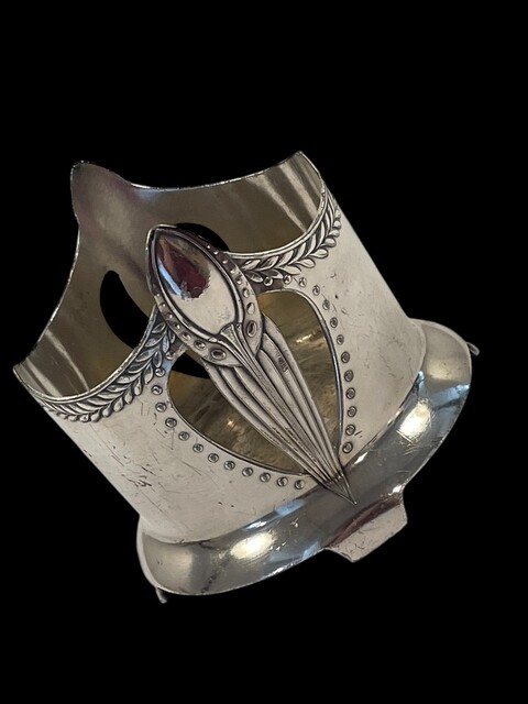 An English Art Nouveau Silver Plated Bottle Holder.