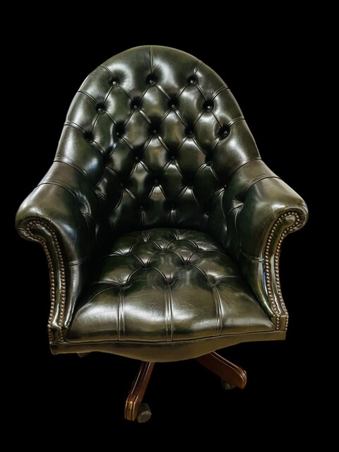 An English Button Back Green Chesterfield Revolving Desk Chair with Tilt Action and adjustable in Height.