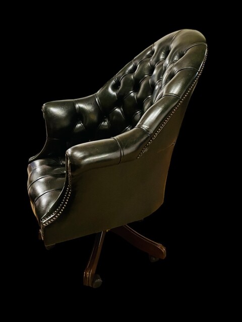 An English Button Back Green Chesterfield Revolving Desk Chair with Tilt Action and adjustable in Height.