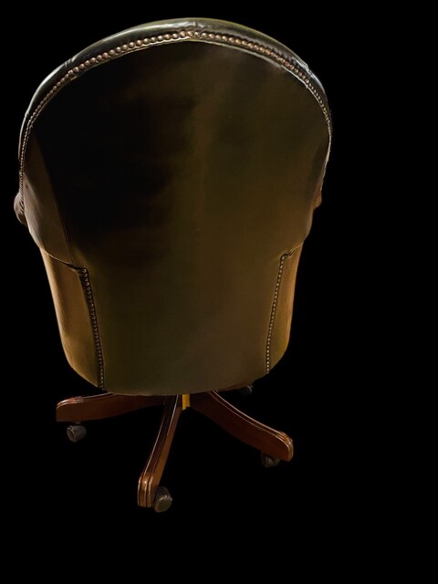 An English Button Back Green Chesterfield Revolving Desk Chair with Tilt Action and adjustable in Height.