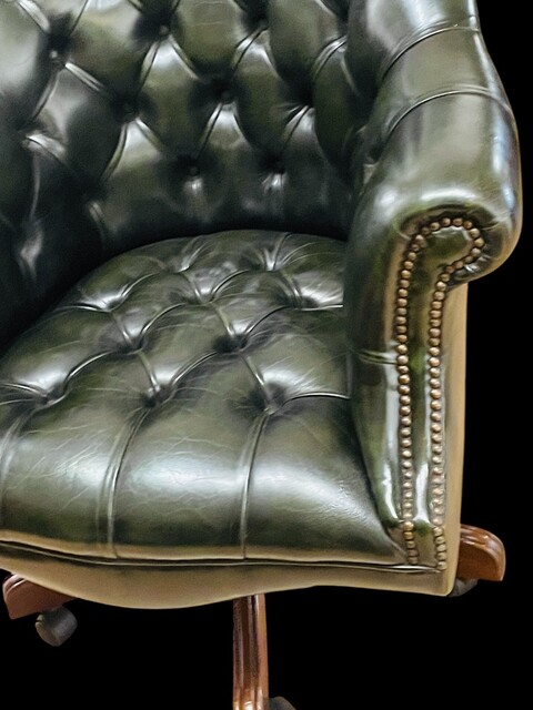 An English Button Back Green Chesterfield Revolving Desk Chair with Tilt Action and adjustable in Height.