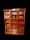 An English Early 20th Century mahogany sectional Bookcase by Minty of Oxford.