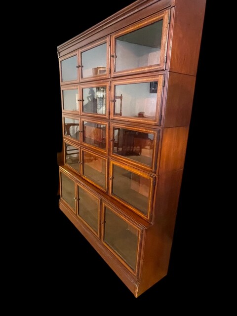 An English Early 20th Century mahogany sectional Bookcase by Minty of Oxford.