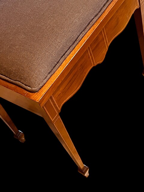 An English Edwardian Mahogany Piano Stool having Satinwood Inlay.
