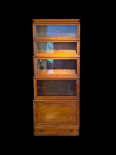 An English End 19th Century Oak Globe Wernicke  ' Waterfall ' Bookcase.