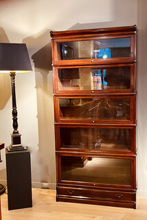 An English Mahogany Globe Wernicke Bookcase and a ' Grand Tour ' Lamp Stand.