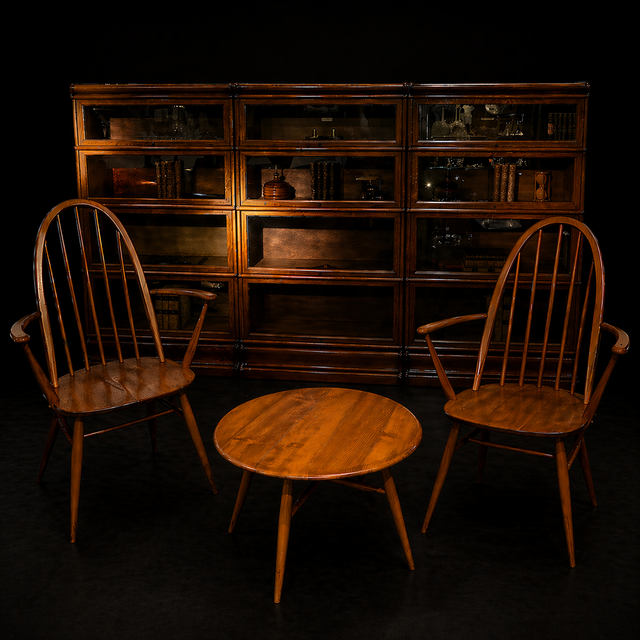 An English Mid-Century Ercol Set with Pair of Armchairs, Coffee Table and Globe Wernicke Bookcases