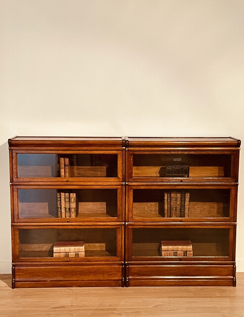An English Pair of  Oak Globe Wernicke Bookcases. Each Three Sections Hight.