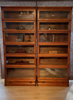 An English Pair of Two Oak Globe Wernicke Bookcases.