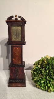 An English Rosewood and Mahogany 19th Century Miniature Clock having a Beautiful Floral Inlay. Signed M. Hammond 1889.